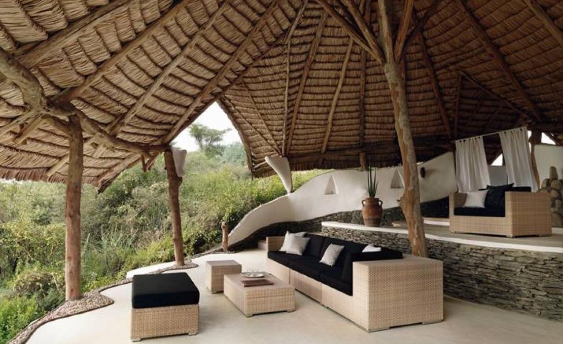 Уличное кресло от фабрики Dedon модель Lounge Arm 